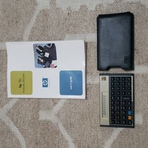 HP 12C Financial Calculator - Black (HP12CPLAT) with User's Guide.